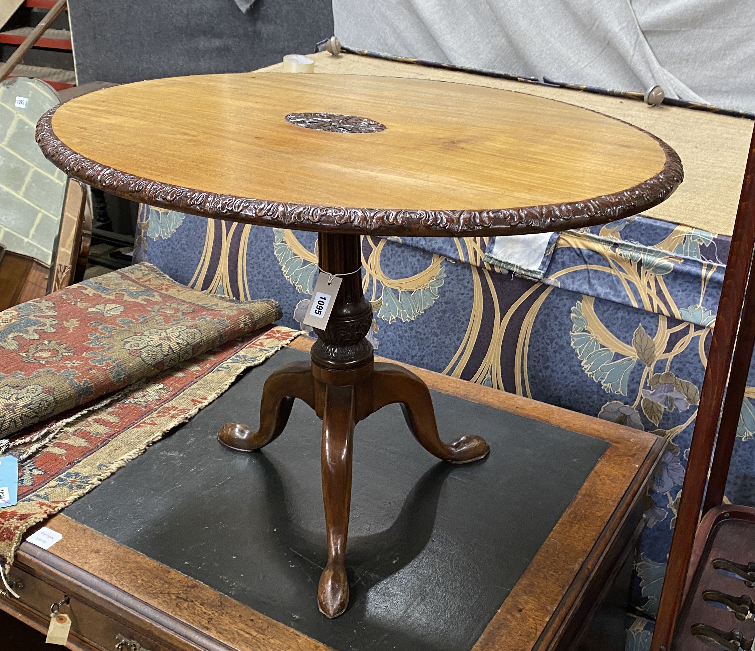 A George III and later oval tilt top occasional table, width 81cm, height 55cm